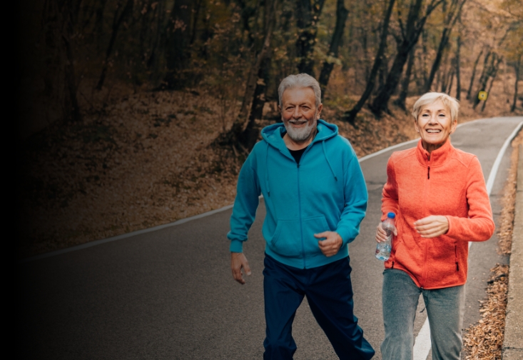 Older adults walking on a nice fall day