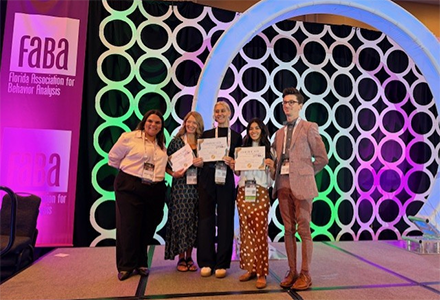 Aracelis Manosalvas receiving the Most Impactful and Innovative Poster award