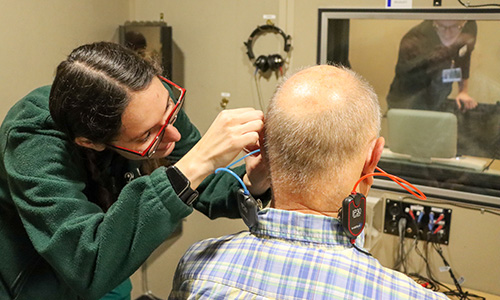 A student conducts a hearing test in 2025
