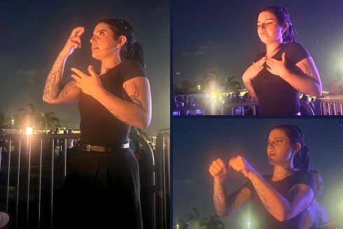 Carly Missildine provides ASL interpretation during a concert performance at MIDFLORIDA Credit Union Amphitheatre.