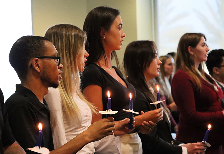 Candlelit induction ceremony