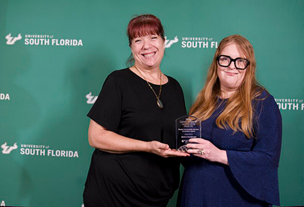 Jessica Vanderwerf receives her award from Darlene Goodrich