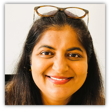 Woman with long wavy black hair.