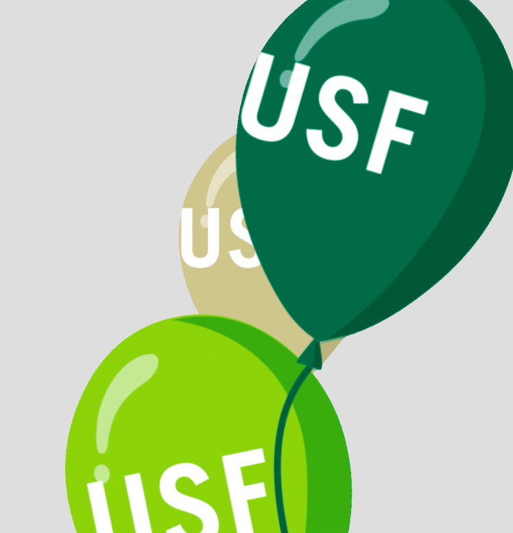 three balloons in USF's colors floating away