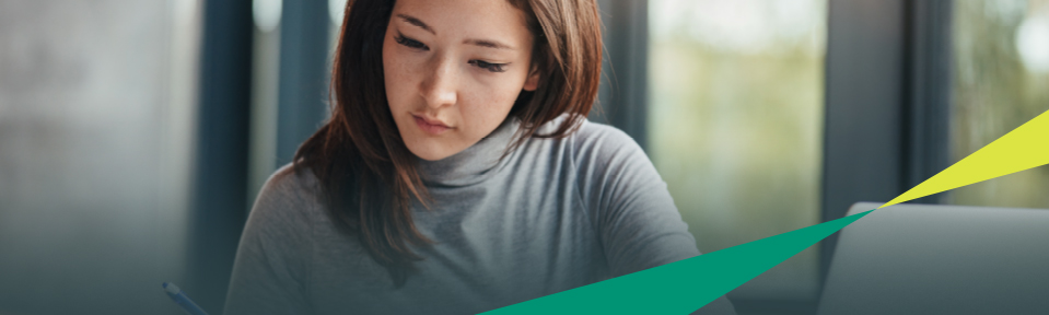 A female studying for her GMAT exam.