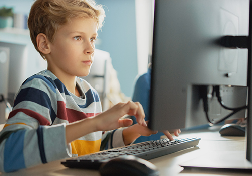 middle-school-cyber-student-using-computer