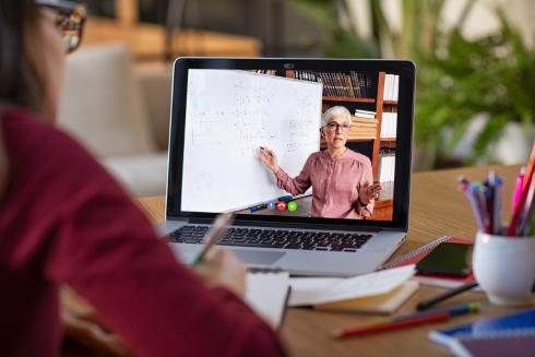 A student watching an online lecture
