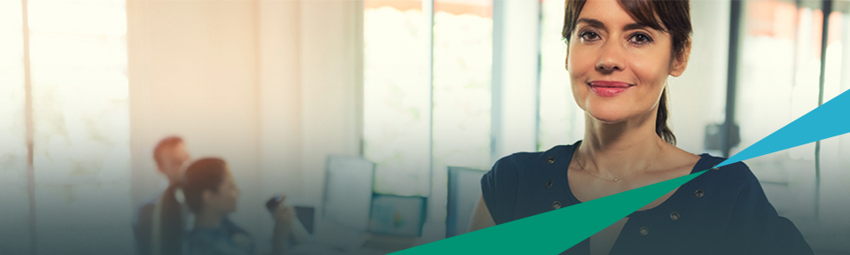 A woman in an office ready to be contacted with any questions regarding USF’s Corporate Training and Professional Education