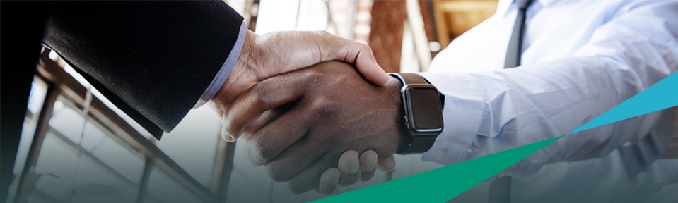 Two men shaking hands regarding their partnership with USF