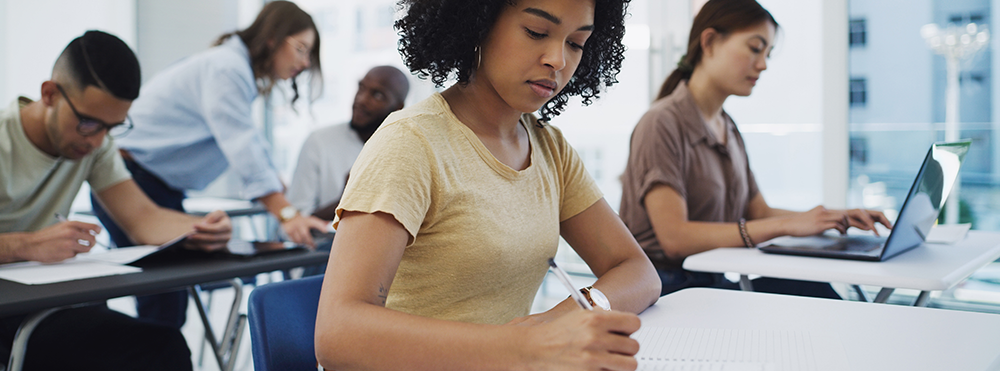 students taking test in classroom