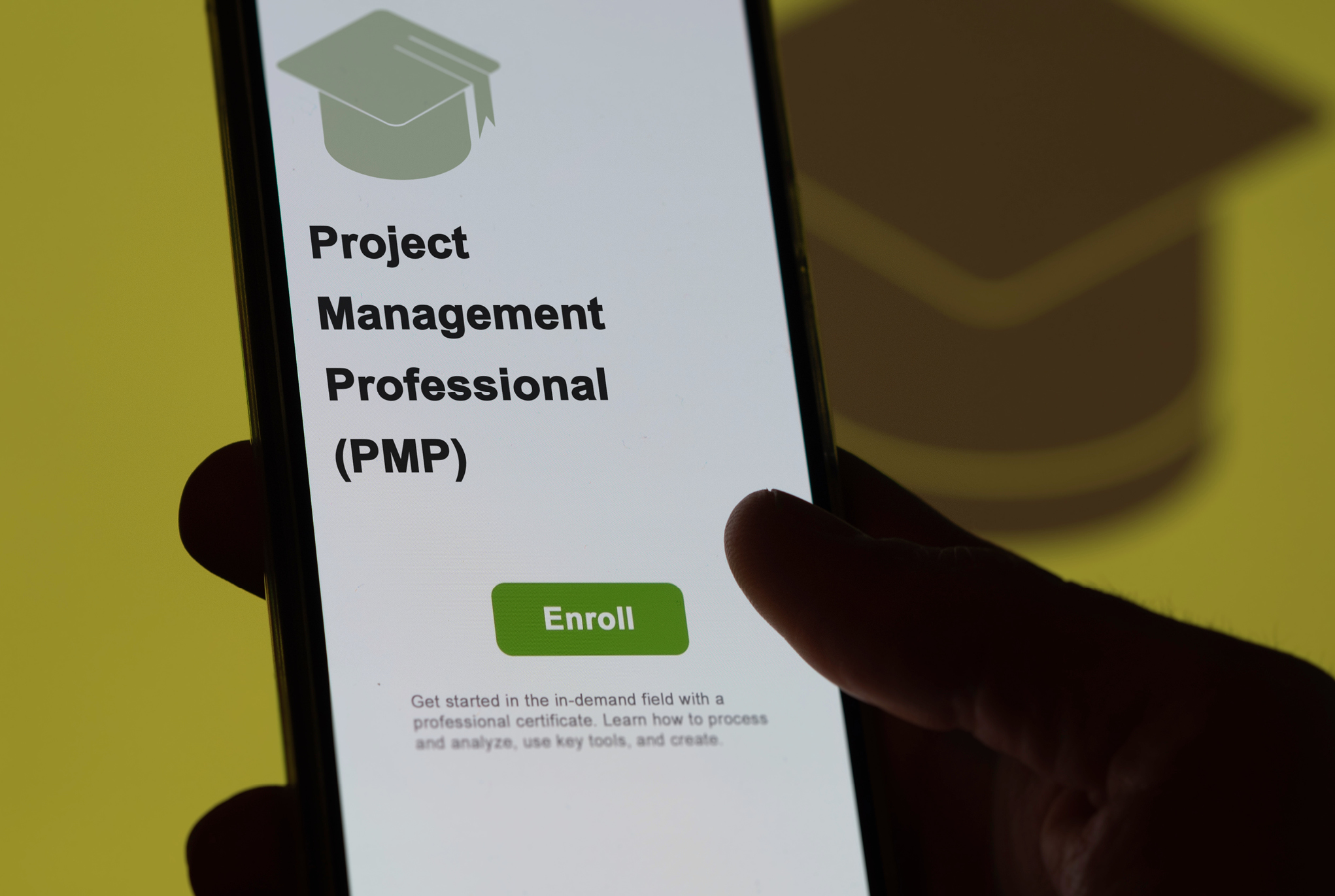 A phone screen displaying the Project Management Professional (PMP) course sign-up page