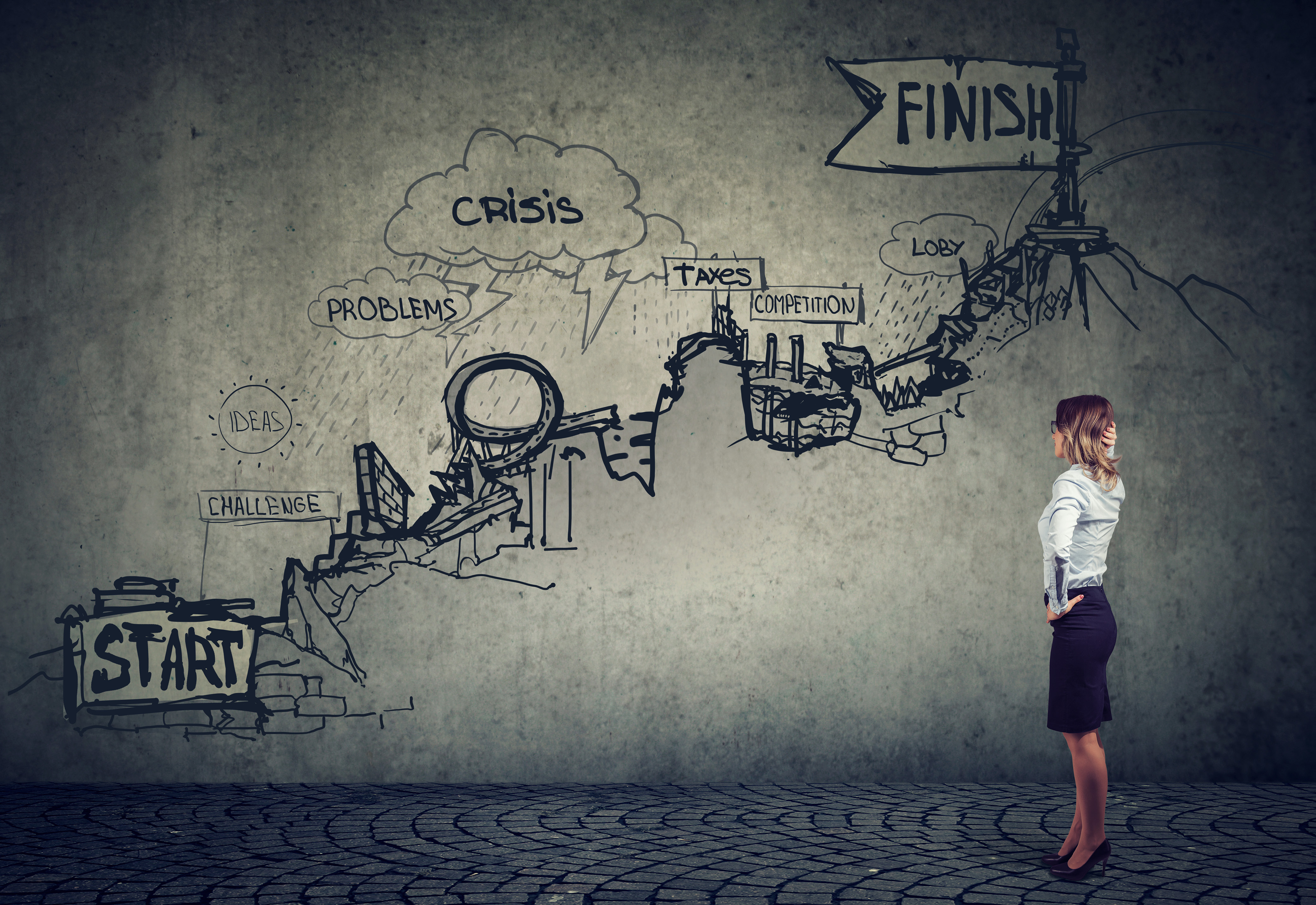 A woman looking at a full pathway from start to finish