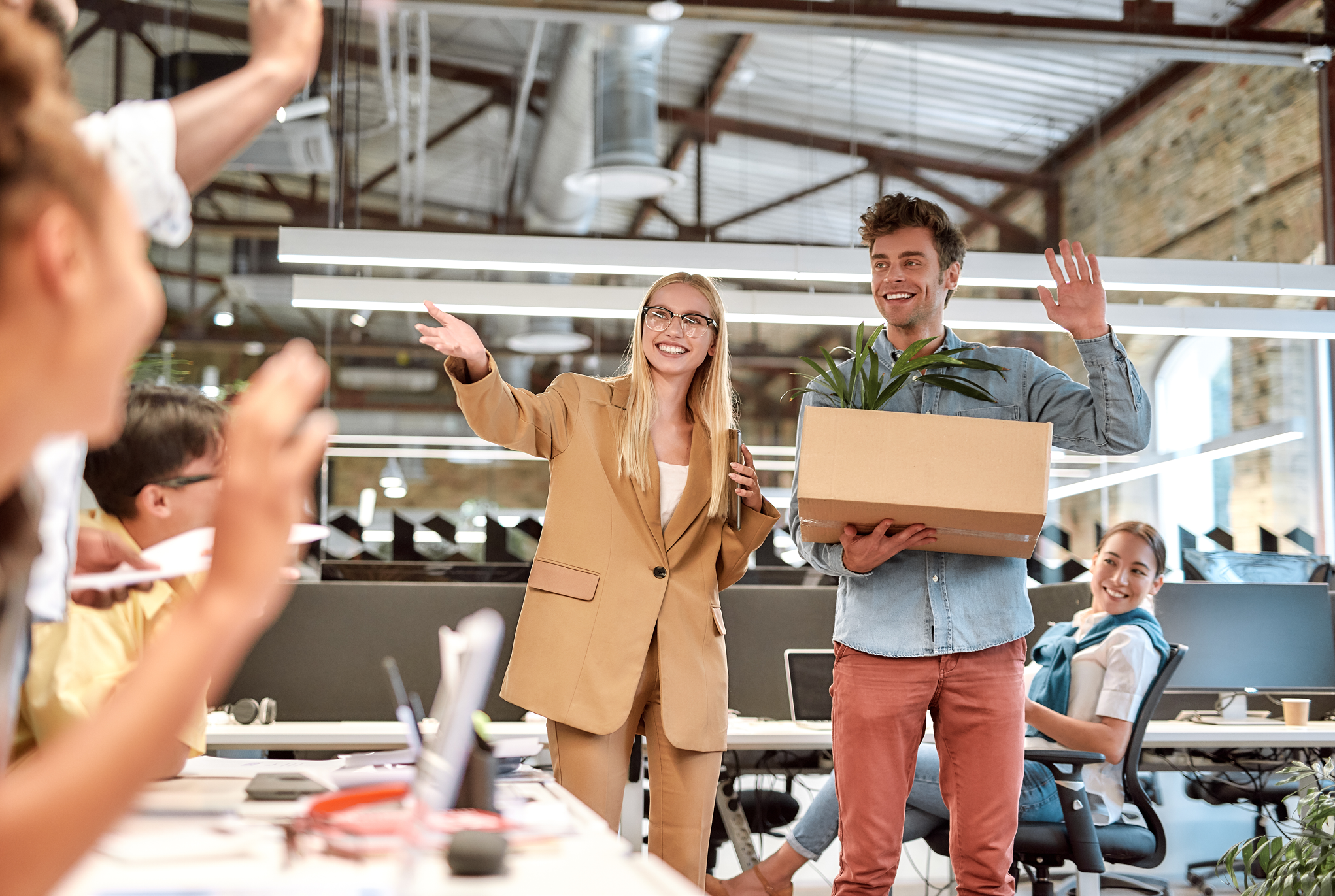 An employee being introduced to the team in their workplace.
