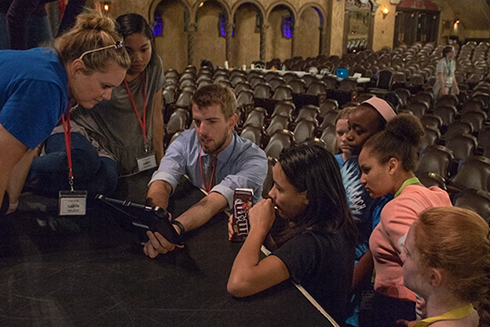 Tampa Theatre Film Camp participants with instructor at the Tampa Theatre