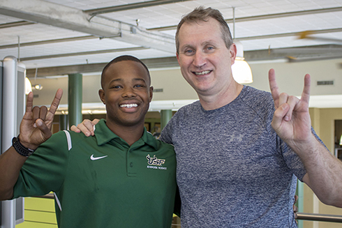 USF student and faculty member Rob Knoeppel pose for a picture at the USF Campus Recreation Center