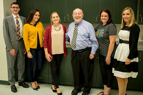 USF professor Steve Permuth with graduate students