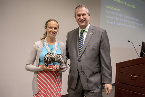 Alisha Braun receiving the Tritle Award