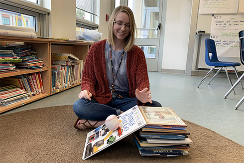 USF Alumna Malina Pakulak in a classroom