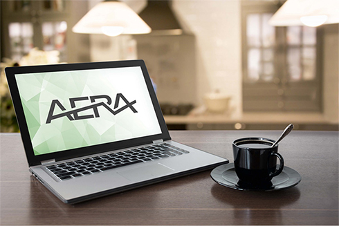 Laptop with AERA logo on screen