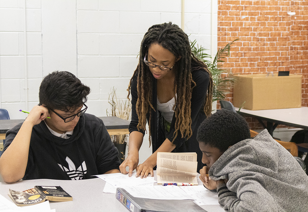 USF student tutors students in reading