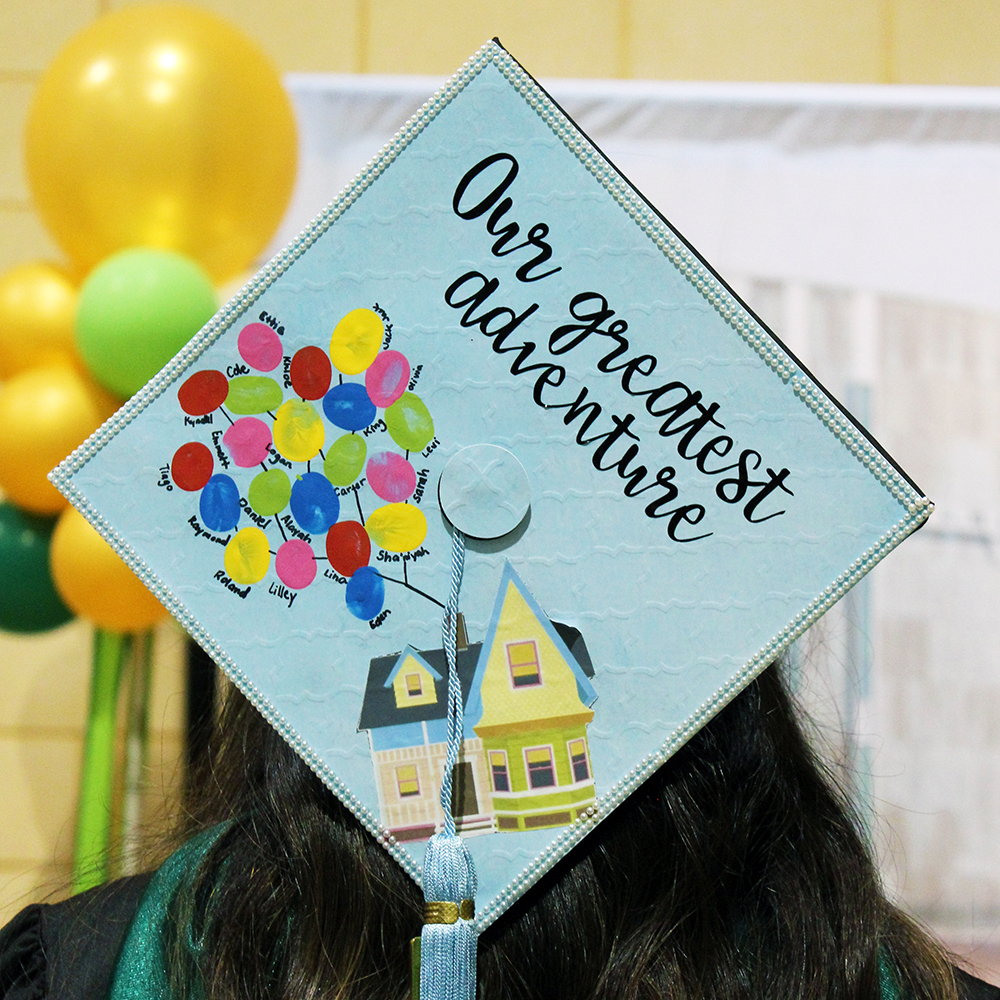 Graduation Cap with "Our Greatest Adventure" written on it