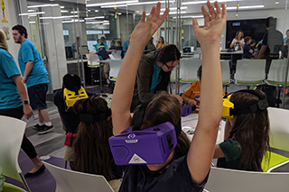 Student with virtual reality headset on