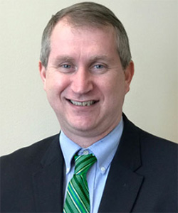 headshot of robert c knoeppel