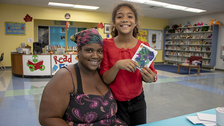 Parent and student complete an art project at Potter Elementary