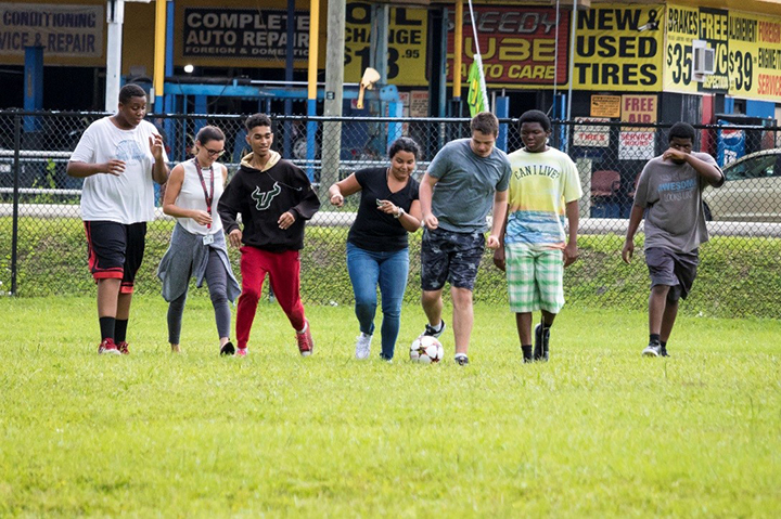 USF teacher candidates and Pepin Academies students play soccer