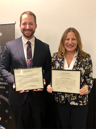 Evan Dart and Shannon Suldo receive awards at APA 2019 Convention