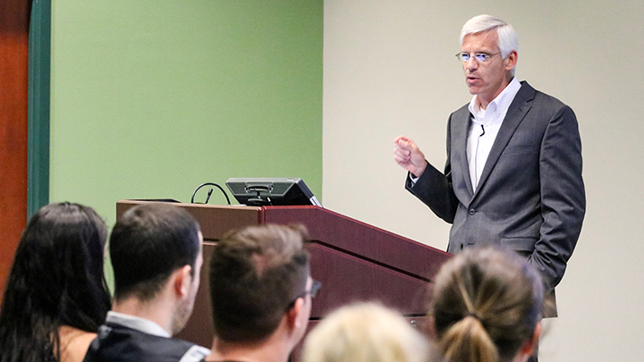 Charles Dorn presenting to students in the USF College of Education's TECO Hall