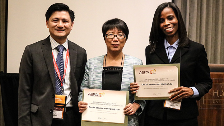 Dr. Yiping Lou and College of Education doctoral student Ora D. Tanner received the Outstanding Research Presentation Award from the AERA Design and Research Special Interest Group