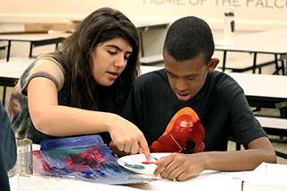 USF Student Teacher with Pepin Academies Student in Art Class