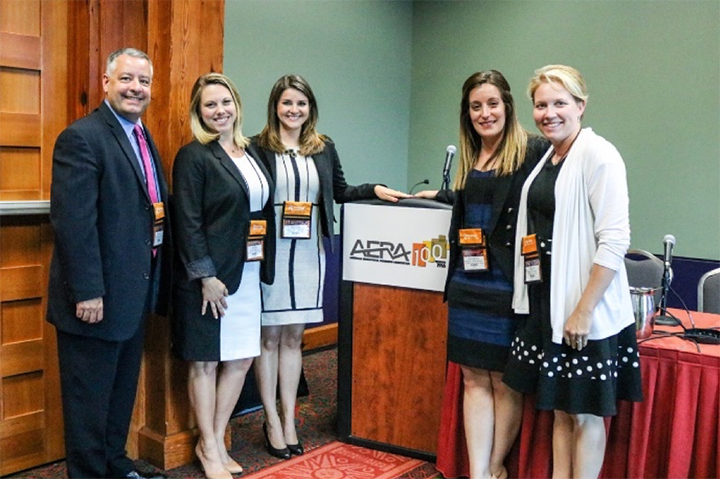 Perrone-Britt with research team at AERA