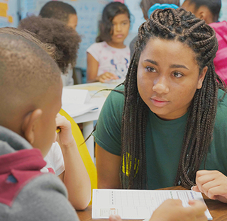 USF student teaching elementary school student