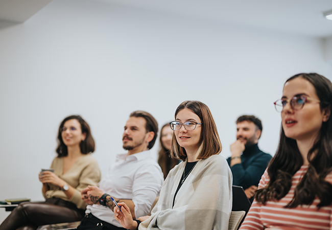 college students sitting in classroom