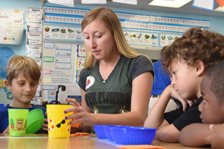 student teacher in school classroom