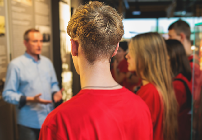 man giving instruction to students