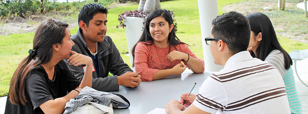 CAMP students discuss an orientation activity