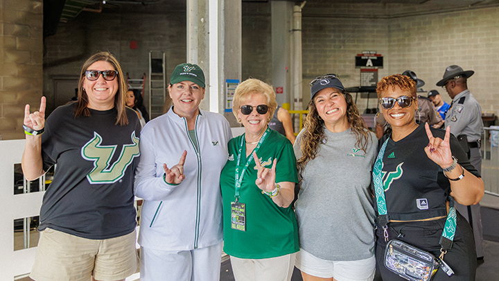 group photo including usf preseident and college of education dean