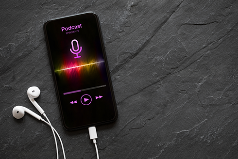 cell phone playing a podcast