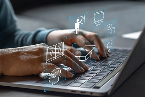 hands hovering over keyboard with graphics of teaching