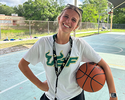 Skylar holding basketball