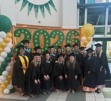 Kristi Cheek with fellow graduates