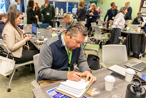 Conference attendees brainstorming