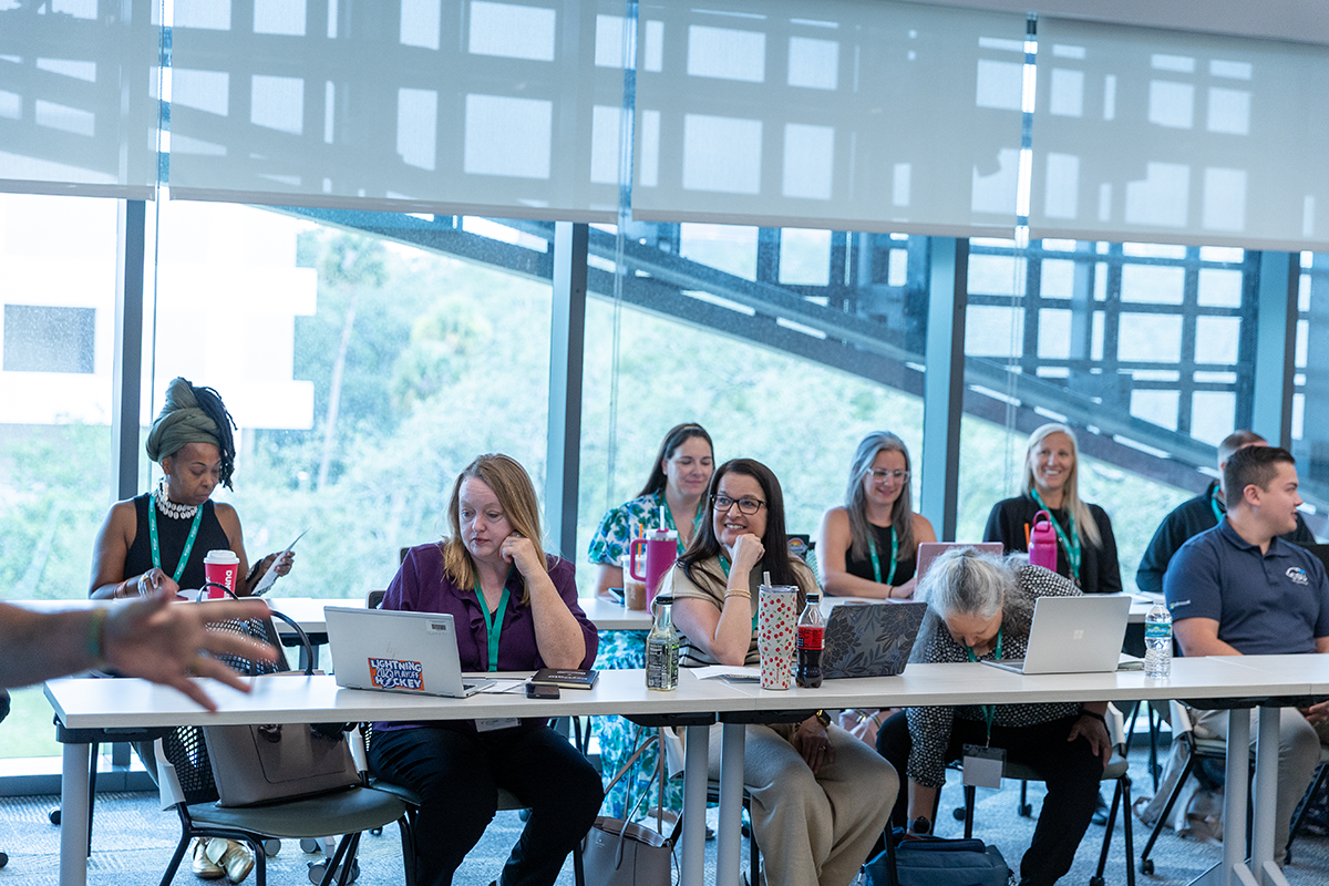 Educators at a long table