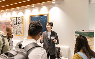 Haotian Lyu presenting his poster