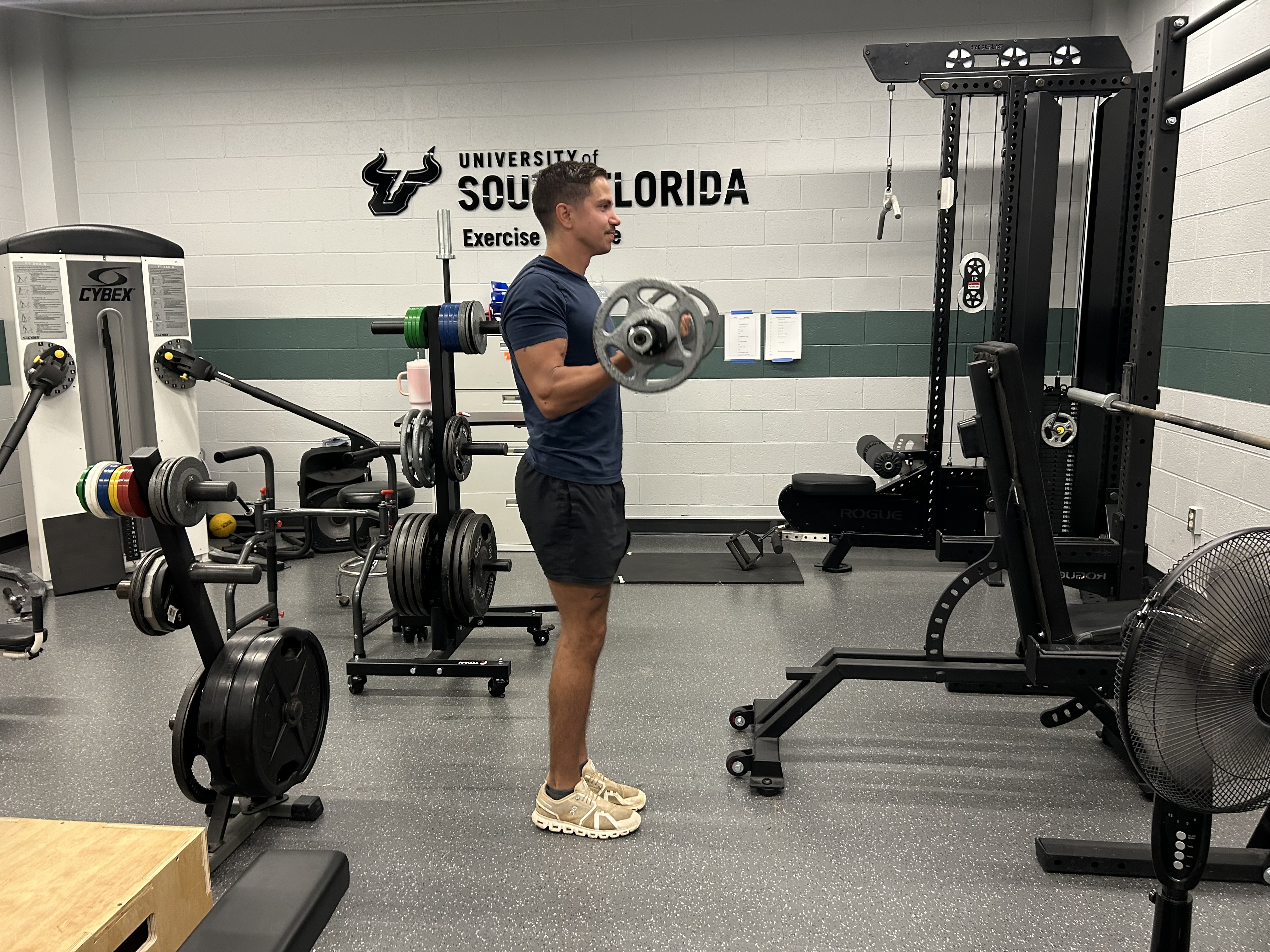 Issa working out in exercise science lab