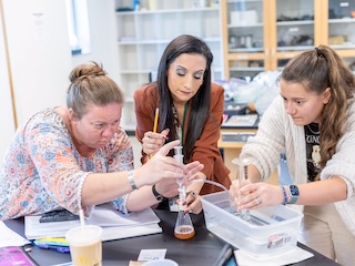 teachers conducting an experiment
