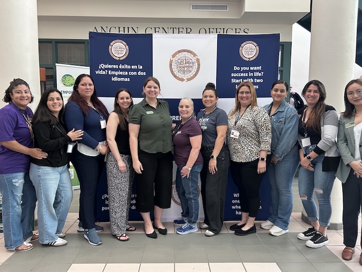a group of smiling teachers